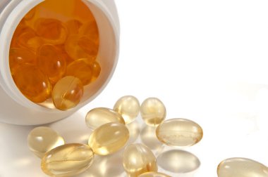 Cod liver oil capsules. clipart