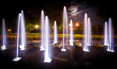 Fountain in the night clipart