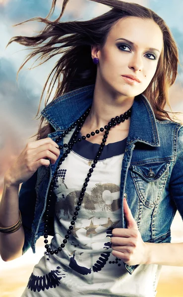 Young woman in jeans jacket — Stock Photo, Image