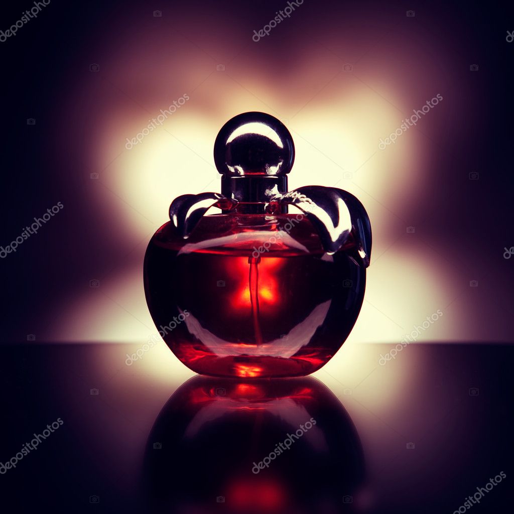 red apple shaped perfume bottle