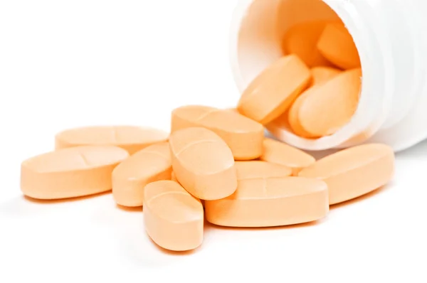 Closeup of yellow pills — Stock Photo, Image