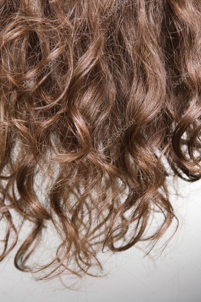 Brown curly hair Stock Photo by ©konstantynov 5099313