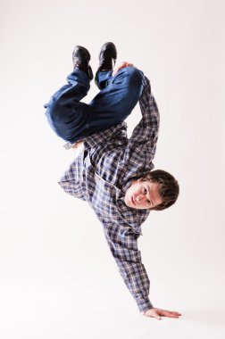 Breakdancer standing on the hand