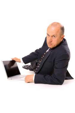 Businessman with laptop on the floor clipart