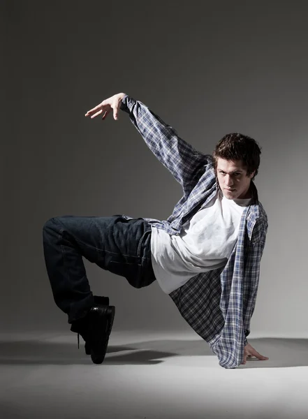 Breakdancer showing his skill — Stok fotoğraf