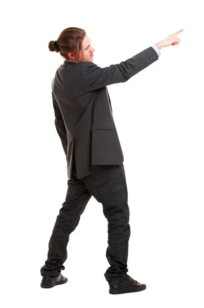 Young businessman pointing at something — Stock Photo, Image