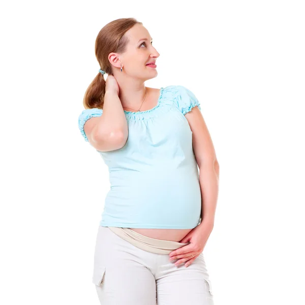 Smiley schwangere Frau schaut auf — Stockfoto