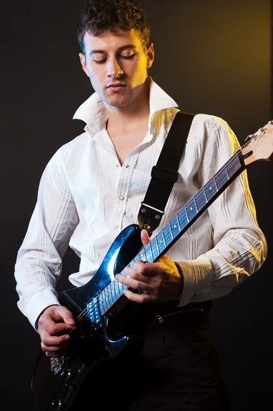 Musician with guitar — Stok fotoğraf