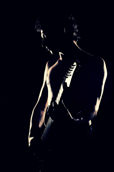 Silhouette d'homme avec guitare — Photo
