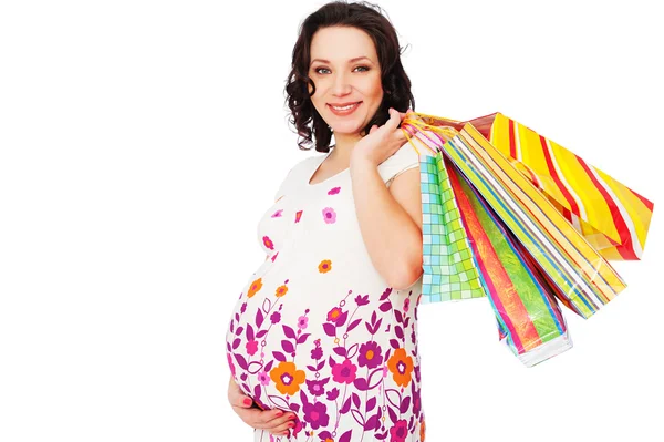 Zwangere vrouw met boodschappentassen — Stockfoto