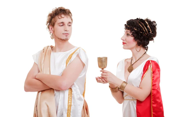 Пара в греческом стиле с вином — стоковое фото