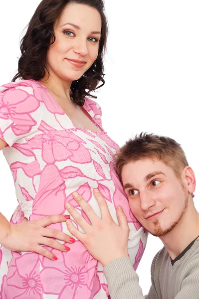 Man listening to his unborn baby — Stock Photo, Image