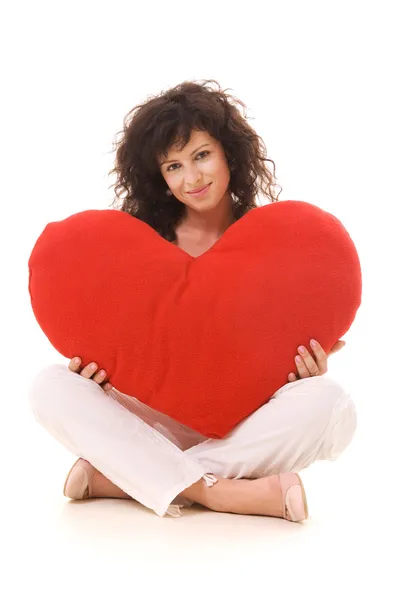 Vackra lockiga med stort rött hjärta — Stockfoto
