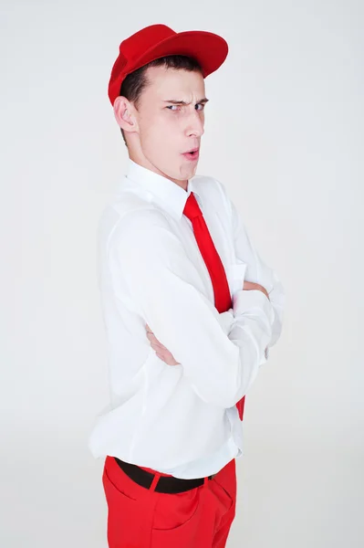 Man in red cap expression resentment — Stock Photo, Image