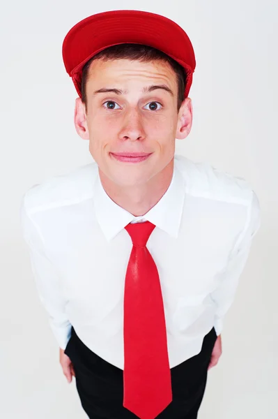 Portret van de man in rode cap en stropdas — Stockfoto