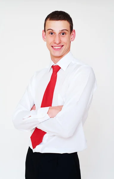 Uomo d'affari sorridente con cravatta rossa — Foto Stock