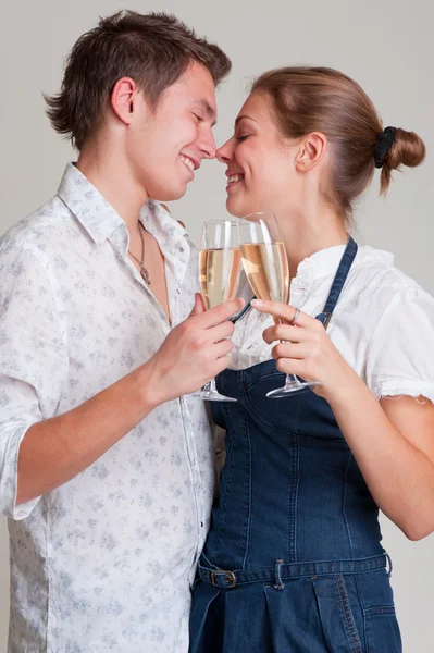 Beautiful smiley couple with champagne — Stock Photo, Image