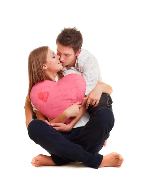 Beautiful young couple with heart — Stock Photo, Image