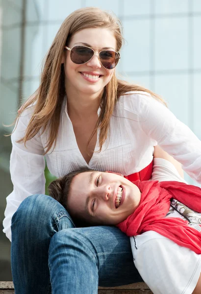 Two teenagers resting at the street — Stock Photo, Image