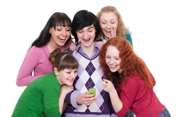 Cheerful friends looking at cellphone — Stock Photo, Image