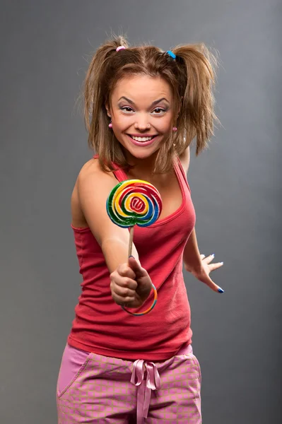 Funny girl with lollipop — Stock Photo, Image