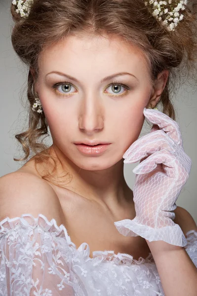 Graceful woman in white gloves — Stock Photo, Image