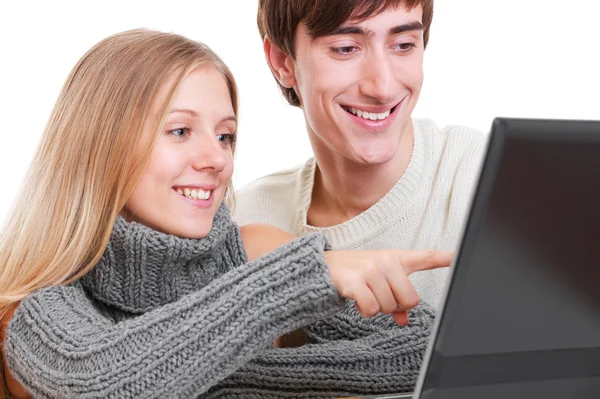 Portrait of smiley couple with laptop — Stock Photo, Image