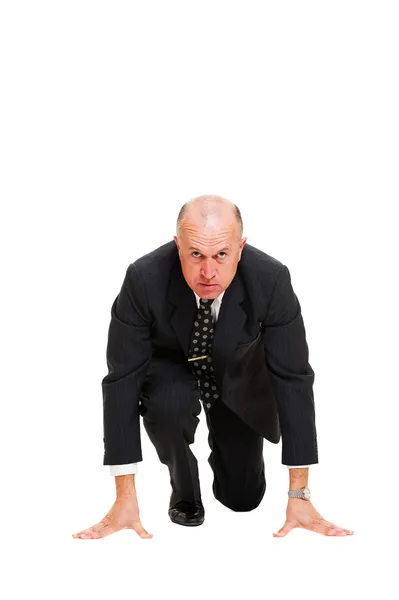 Mature businessman ready for race — Stock Photo, Image
