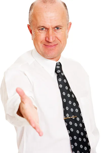Uomo d'affari sorridente pronto per una stretta di mano — Foto Stock