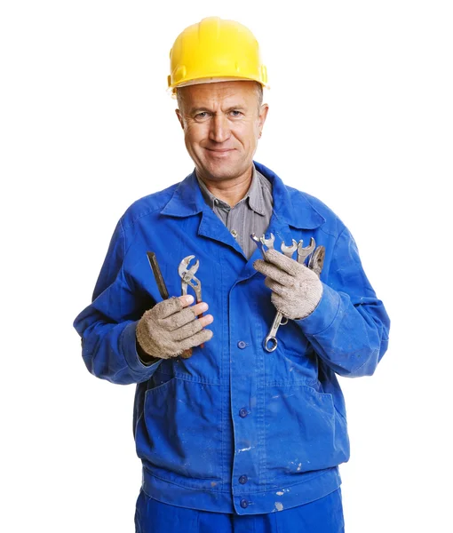 Smiley worker with different tools — Stock Photo, Image