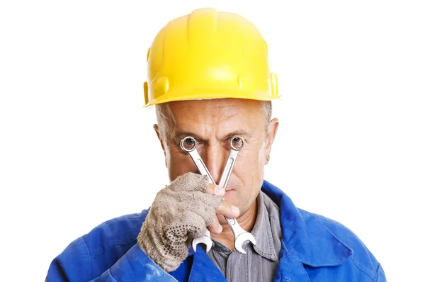 Workman looking through screw keys — Stock Photo, Image