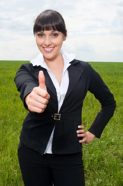 Bizneswoman pokazuje kciuki do góry — Zdjęcie stockowe