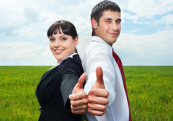 Businesspeople showing thumbs up — Stock Photo, Image
