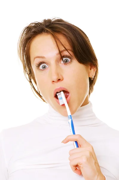 Mujer asombrada con cepillo de dientes — Foto de Stock