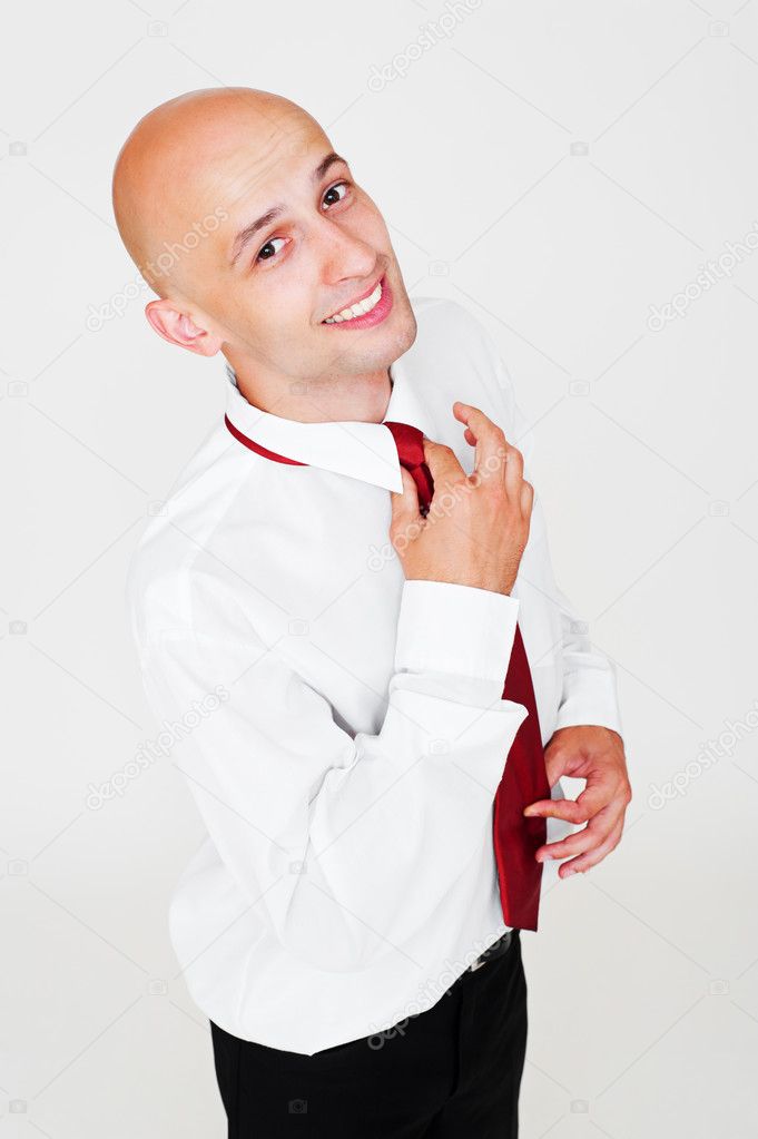 Smiley businessman with red necktie