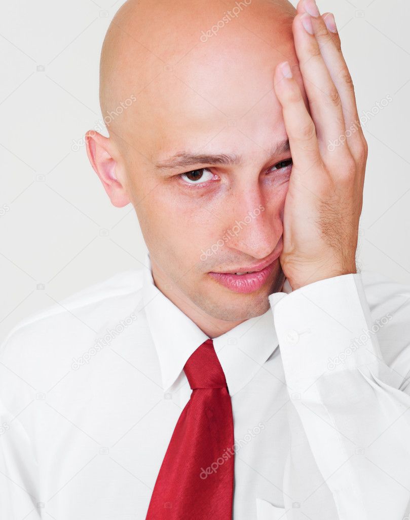 Weary businessman over grey background