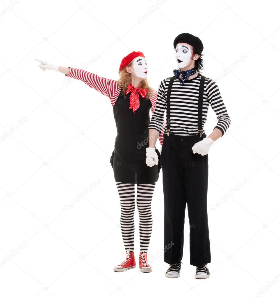 Portrait of mimes. woman pointing at something