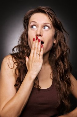 Surprised woman with blue eyes clipart