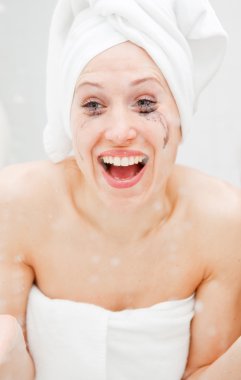 Woman laughing until one cries clipart