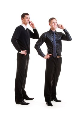 Two businessmen talking on the phone clipart