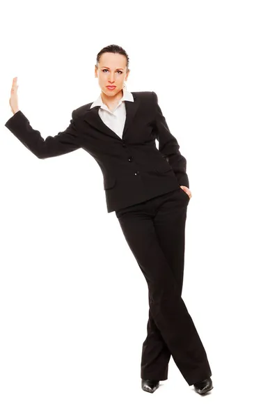 Businesswoman leaning on wall — Stock Photo, Image