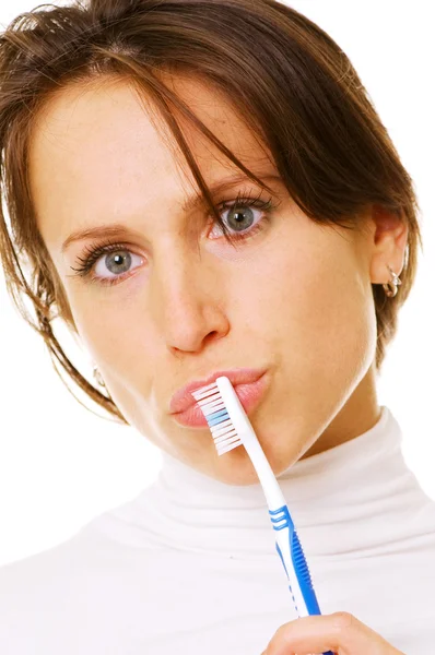 Primer plano de la mujer pensante con cepillo de dientes — Foto de Stock