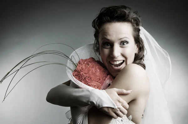 Happy bride holding bouquet — Stock Photo, Image