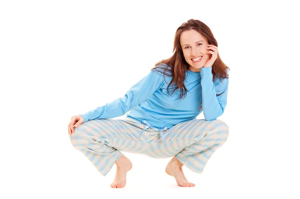 Mulher feliz em pijama azul — Fotografia de Stock