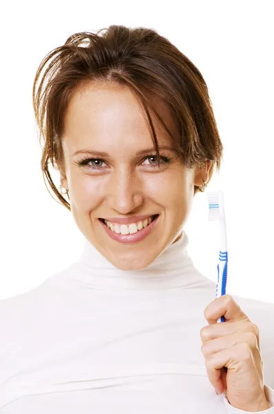 Femme heureuse avec brosse à dents — Photo