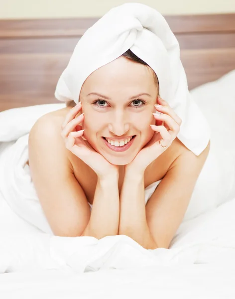 Picture of smiley woman in bed — Stock Photo, Image