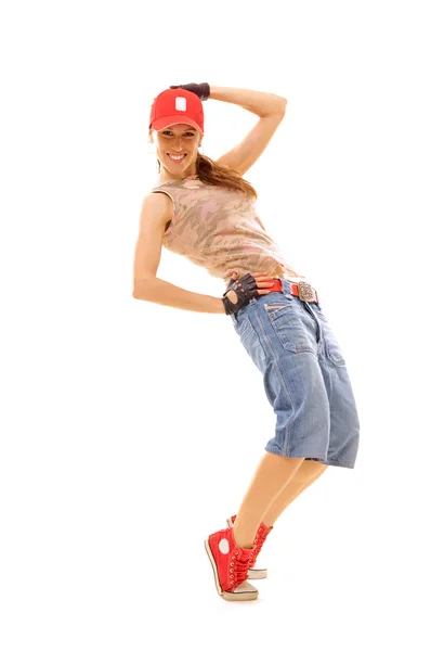 Schlanke Tänzerin mit roter Mütze — Stockfoto
