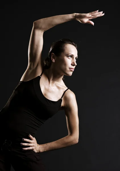 Smiley sportswoman training with pleasure — Stock Photo, Image
