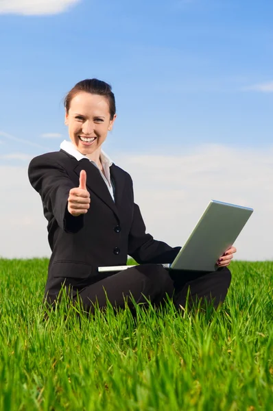 Smiley woman showing thumbs up — Stock Photo, Image