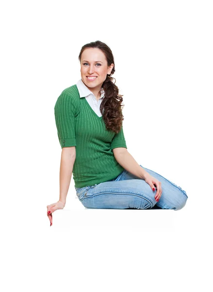 Veselý obličej žena sedící na copyspace — Stock fotografie
